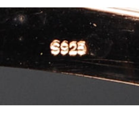 A silver gilt cartier style bangle with CZ stones all around the central roundels. Total weight 17.5g

FREE UK POSTAGE ON ALL