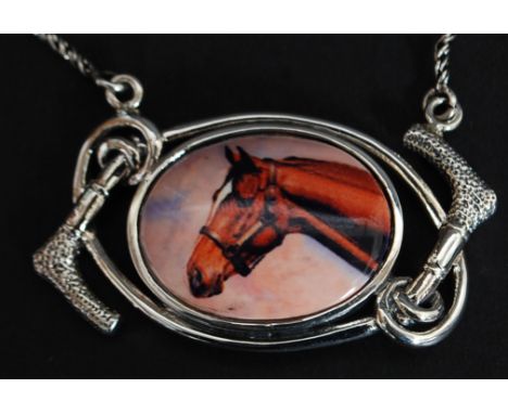 A silver necklace with enamel plaque pictorial image of a horse. Total weight 14.3g.

FREE UK POSTAGE ON ALL LOTS INCLUDING C