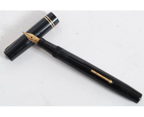 A vintage Mable Todd & Co Swan Self Filler Fountain pen in a black case with gold trim having Swan 14ct nib.
FREE UK POSTAGE 