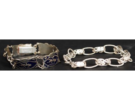 2 silver ladies bracelets, one with enamel pictorial fairy scenes, the other being twist curb linked. Total weight 19g.
FREE 