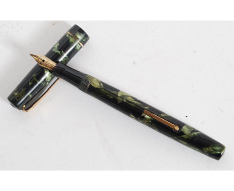 A vintage Mable Todd & Co Swan Self Filler Fountain pen in a marble effect cap and stem with marble effect.
FREE UK POSTAGE O