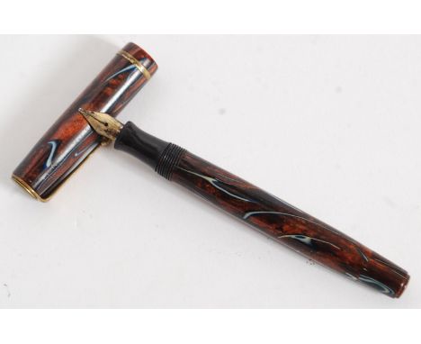 A vintage mid century marble and striped effect Canadian Victory ? Parker - Geo S Parker fountain pen with Parker nib.
FREE U