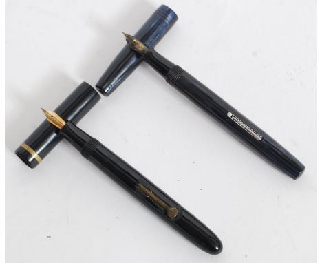 A vintage Watermans Ideal 14ct nib lever fill fountain pen in a blue/grey lustre body. Together with a Burnham No 50 fountain