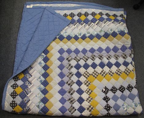 Vintage patchwork quilt with plain blue reverse. (B.P. 24% incl. VAT)