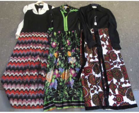 Three 70s vintage maxidresses to include; two similar with black tops and patterned skirts; one floral pattern skirt by 'ein 