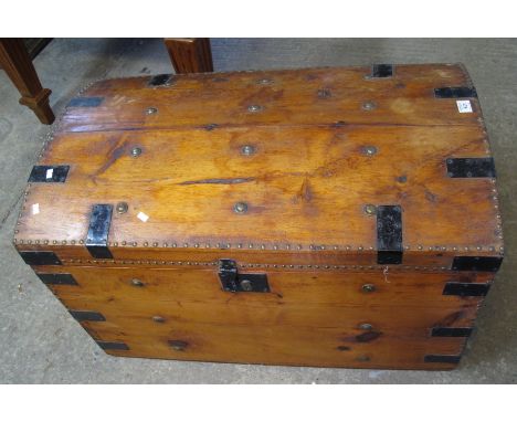 Vintage pine dome top trunk having metal banding and brass studwork decoration with carrying handles. (B.P. 24% incl. VAT) 
