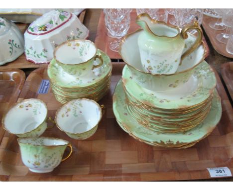 Two trays of 19th Century porcelain teaware on a white and floral ground. Together with part Japanese tea service. (2)(B.P. 2