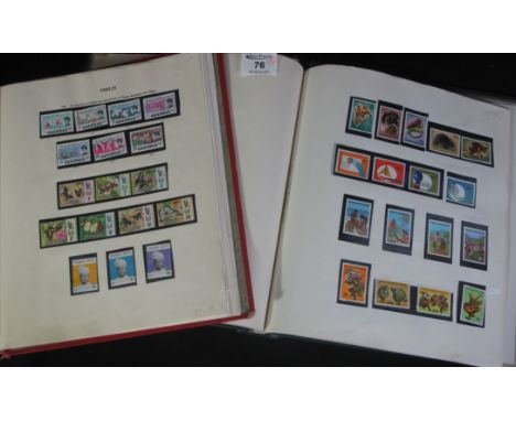 British Commonwealth mint stamp collection with countries: North Borneo to Papua New Guinea in two New Age albums, hundreds.(