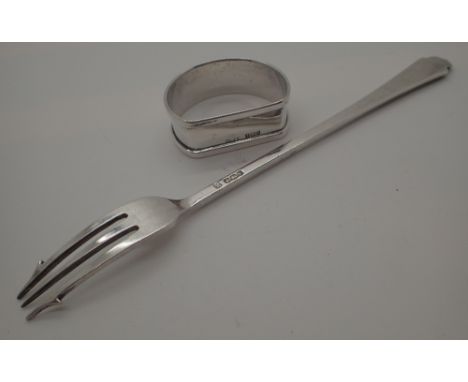 Two pieces of silver, one fork and one napkin ring