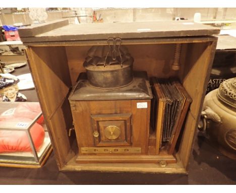 Original late Victorian gas powered magic lantern with focusing bellows and a wooden case 