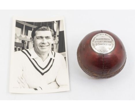 A significant mounted cricket ball, presented to Derek Shackleton early in his career for taking 9 for 37 for Hampshire 2nd X
