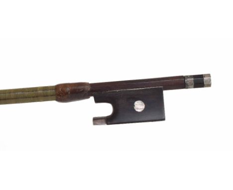 Silver mounted violin bow, unstamped, the stick round, the associated ebony frog inlaid with pearl eyes and the associated eb