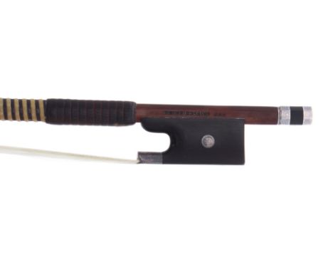 German silver mounted violin bow by and stamped Heinz Dolling***, the stick octagonal, the ebony frog inlaid with silver eyes