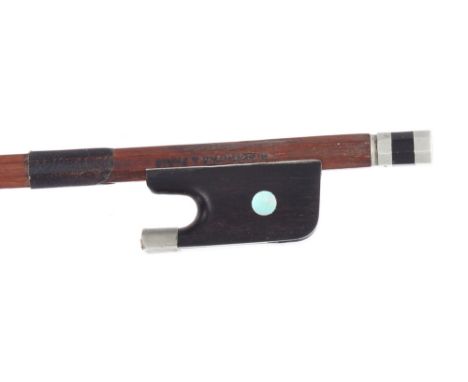 French nickel mounted violin bow by E. Ouchard and stamped N. Lemaire á Paris, the stick round, the ebony frog inlaid with pe