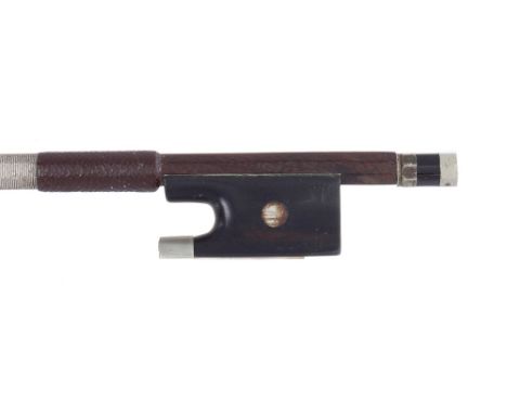 French nickel mounted violin bow of the Pageot School, the stick round, the ebony frog inlaid with pearl eyes and the ebony a