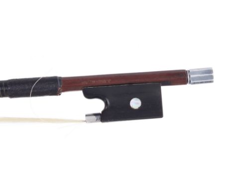 Silver mounted violin bow stamped J. Brown JNR, the stick round, the ebony frog inlaid with pearl eyes, with sterling silver 