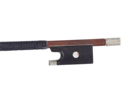 French nickel mounted violin bow stamped Caressa &amp; Francais, the stick round, the ebony frog inlaid with pearl eyes and w