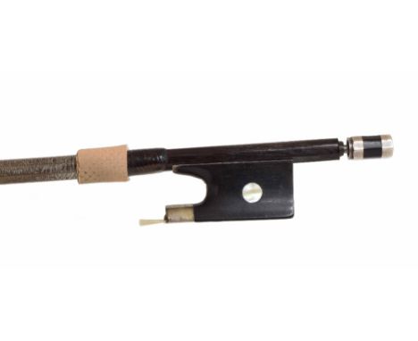 German silver mounted violin bow, unstamped, the stick round, the ebony frog inlaid with pearl eyes and the ebony adjuster wi