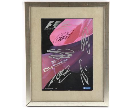 Signed F1 programme - Signed on front by Michael Schumacher, Jenson Button, Kimi Räikkönen, Ralf Schumacher, David Coulthard.