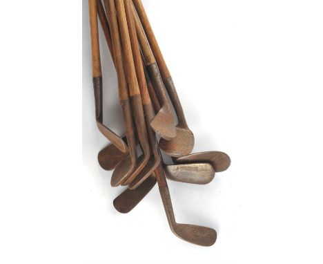 Collection of 11 vintage Iron golf clubs. To include: Niblick W.F.Johns Lee-on-Solent, Mashie Niblick, Mashie special, Goodwo