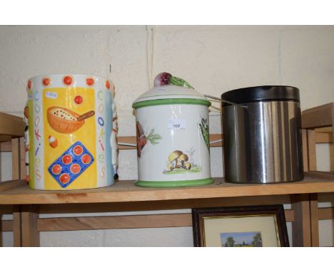 Two ceramic biscuit barrels and another