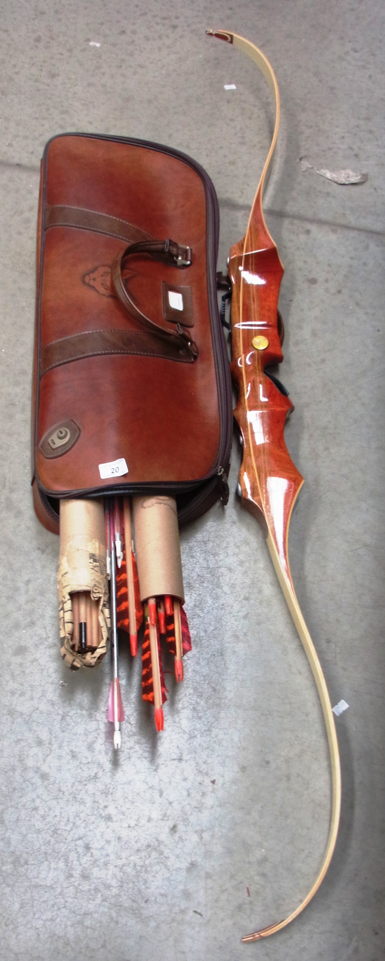 Border Bows Kelso Scotland archery bow with a quantity of arrrows.