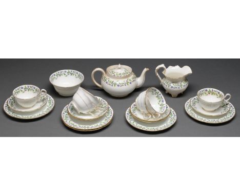 An Aynsley tea service, c1930, printed and painted with French style trailing sprigged borders, teapot and cover 12cm h  In s