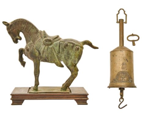 A Tang style bronze sculpture of a horse, uneven green patina, 23cm h, wood stand and an English clockwork brass bottle jack,