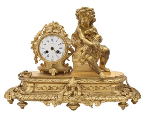 A French ormolu mantel clock, in Louis XVI style, modelled with the seated figure of the infant Bacchus beside festooned drum