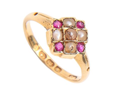 A Victorian ruby and split pearl ring, in 18ct gold, Birmingham 1900, 3g, size L½  Two pearls chipped and slight wear