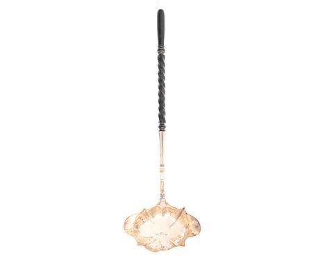 A George III silver punch ladle,&nbsp; with ebonised spiral handle, 30cm l, by Philip Garden, London 1795  Marks a little rub