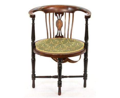 An Edwardian mahogany and inlaid salon chair, with padded oval seat  Light wear and requires a clean