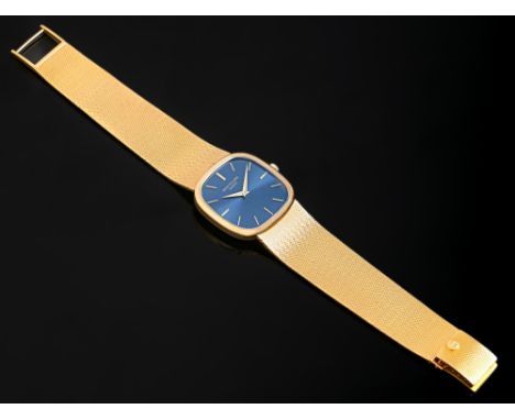 A Patek Philippe 18ct gold cushion shaped gentleman's wristwatch, Ref 3852 / 001, calibre 215, Movement No 1328631, the blue 