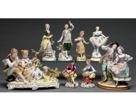 Eight Sitzendorf and other German porcelain figures and groups, 20th c, after, or inspired by, Meissen models, 21cm h and sma