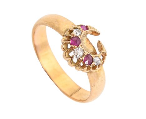 A 22ct gold wedding ring, later mounted with the ruby and diamond crescent shaped head of a stickpin or similar, Birmingham 1