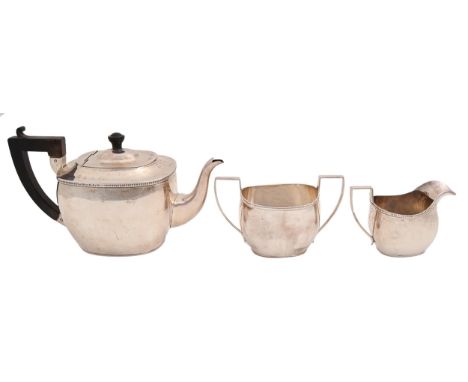 A George V silver tea service, of plain oblong form, teapot 14cm h, marks rubbed, by S Blanckensee &amp; Son Ltd, Chester 191