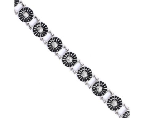 Georg Jensen. A silver and black enamel daisy bracelet,&nbsp;19cm l, maker's mark, 19.7g  Good condition