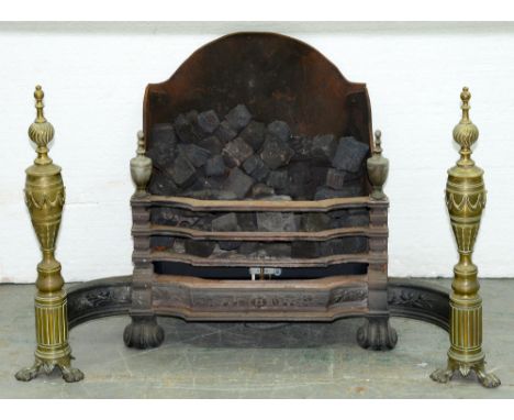 A cast iron and brass basket grate, 20th c, in neo classical style, 64cm h, 98cm l  Complete and undamaged, polish residues o