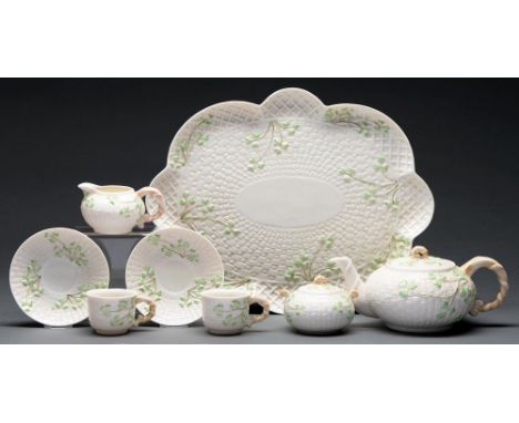 A Belleek style Shamrock cabaret set, 20th c, tray 43.5cm l, green printed spurious harp and crown mark (10)  Good condition