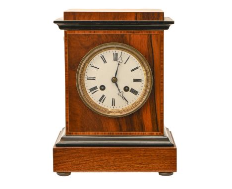 A French walnut, tulipwood and ebonised mantel clock, late 19th c, with enamel dial and bell striking movement, on brass feet