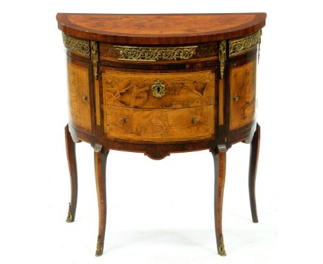 A Northern European ormolu mounted rosewood, walnut, marquetry and penwork commode, 19th c, the top with cartouche and helm f