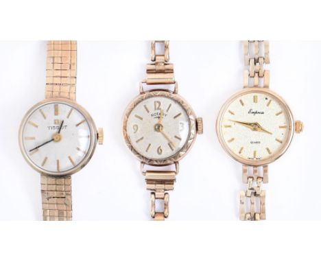 Three Tissot, Rotary and Empress 9ct gold lady's wristwatches, the last with quartz movement, 36.8g  All in good condition, m