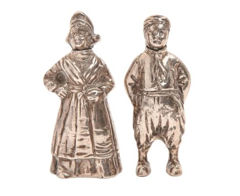 A pair of Dutch silver figural pepperettes, c1900, in the form of a boy and girl, 80mm h, maker's mark HH and control marks, 