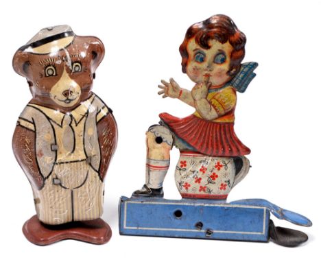 A clockwork lithographed tinplate bear toy, mid 20th c, marked Made in Great Britain, 11.5cm h and an earlier 1920's lever ac