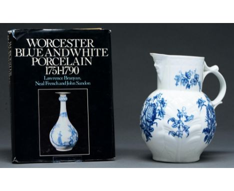 A Worcester blue and white cabbage leaf moulded mask jug, c1765-77, transfer printed with the Cabbage Rose Sprays / Natural S