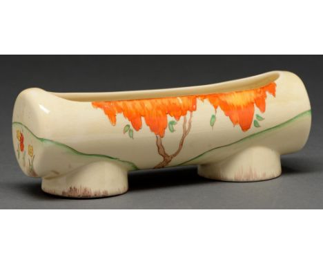 Clarice Cliff.&nbsp; An A J Wilkinson Taormina (orange) flower trough, 1935,&nbsp;18cm l, printed mark  One or two minute scr