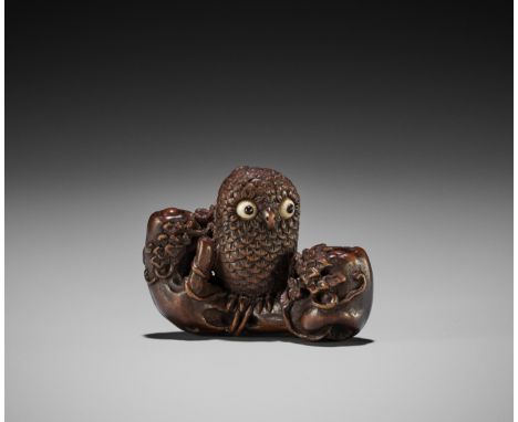 IKKYU: A WOOD NETSUKE OF AN OWL WITH MOVABLE OWLETSBy Ikkyu, signed Ikkyu 一丘Japan, Nagoya, 19th century, Edo period (1615-186