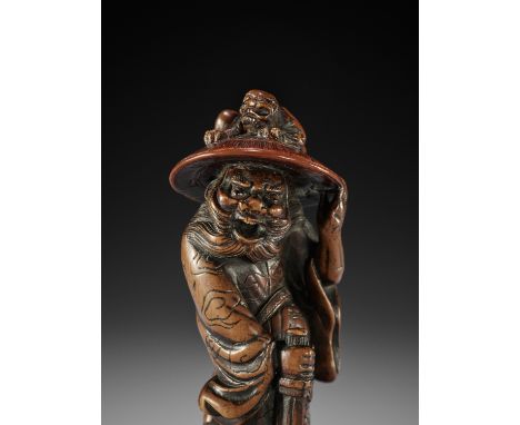 MITSUHARU: A SUPERB WOOD NETSUKE OF SHOKI AND ONIBy Mitsuharu, unsignedJapan, Kyoto, late 18th century, Edo period (1615-1868