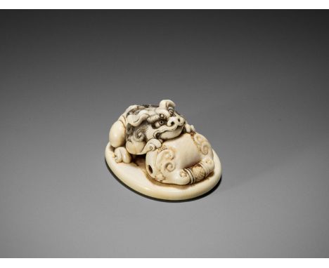 A WALRUS IVORY SEAL NETSUKE OF A SHISHI WITH MOKUGYO, ATTRIBUTED TO RENSAIAttributed to Rensai, unsigned Japan, Tokyo, Asakus