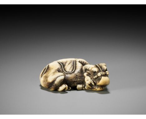 TOMOTADA: A GOOD STAG ANTLER NETSUKE OF A RECUMBENT COW AND CALFSigned Tomotada 友忠Japan, Kyoto, 18th century, Edo period (161